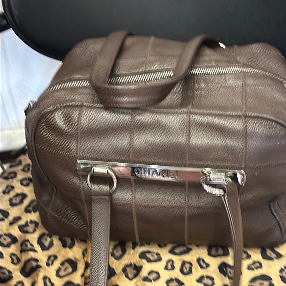 CHANEL Brown Duffel Bag with Vintage Leather and Sturdy Handles